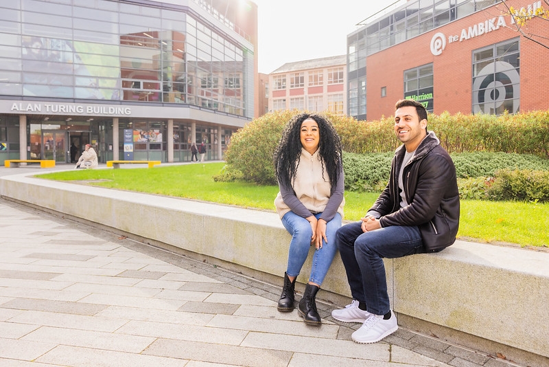 Two students in courtyard for Welcome Week